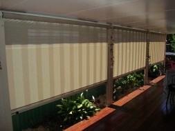 WInder Operated Side Channel Blinds with lock off mechanism in the bottom rail